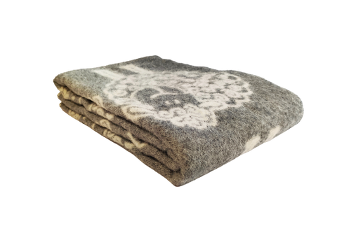 Jacquard Decke aus Wolle grau mit lockigen Schafen
